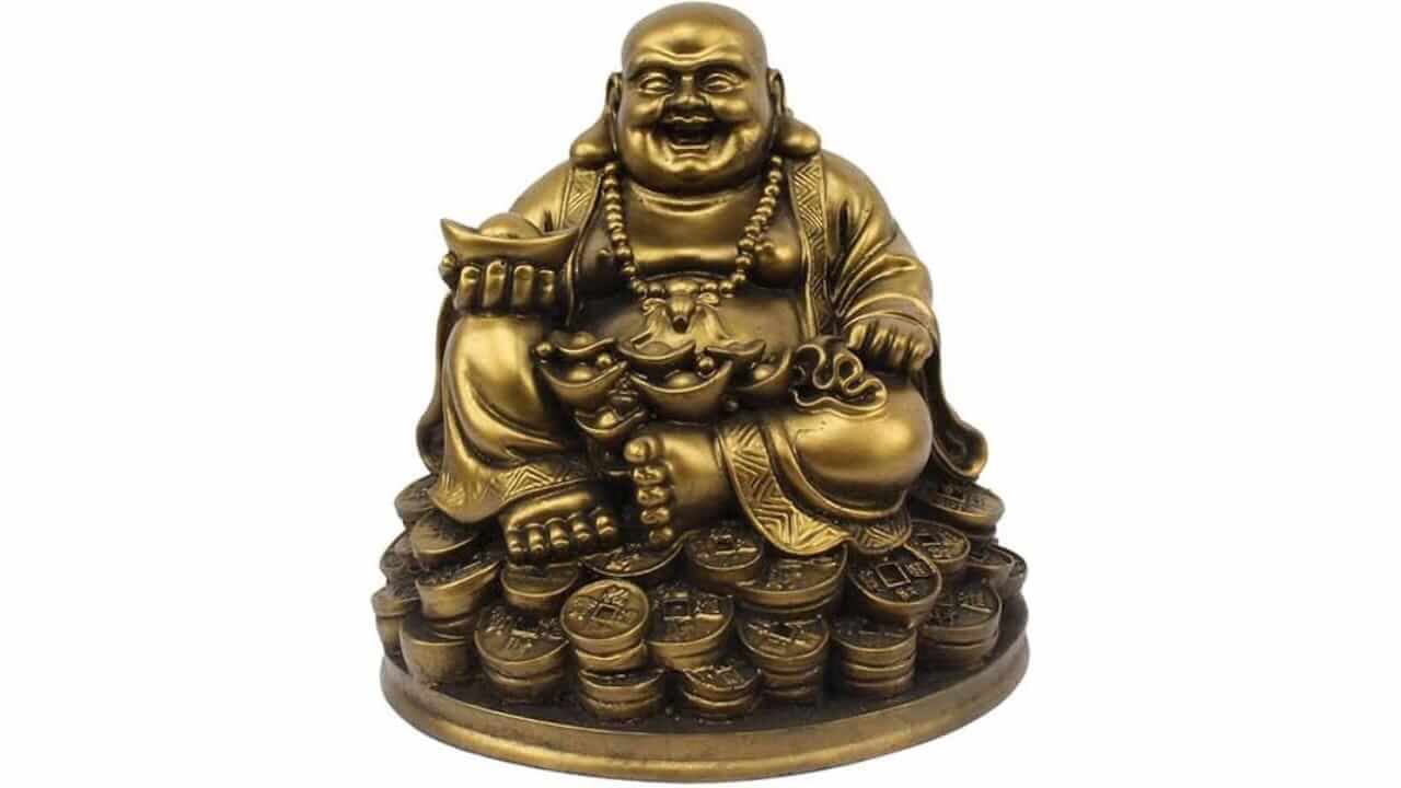 लाफिंग बुद्धा खूप शुभ आहे, पण घरात 'या' ठिकाणी ठेवल्याने नुकसान होऊ शकते